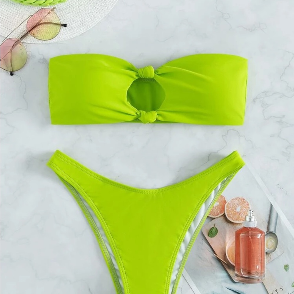 Brand new two piece bathing suit. Neon green